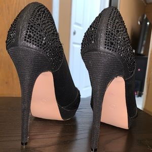 All black jeweled heels